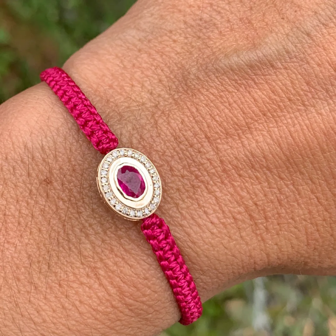 Ruby and Diamond braided bracelet in 10k yellow gold.