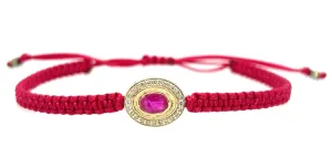 Ruby and Diamond braided bracelet in 10k yellow gold.