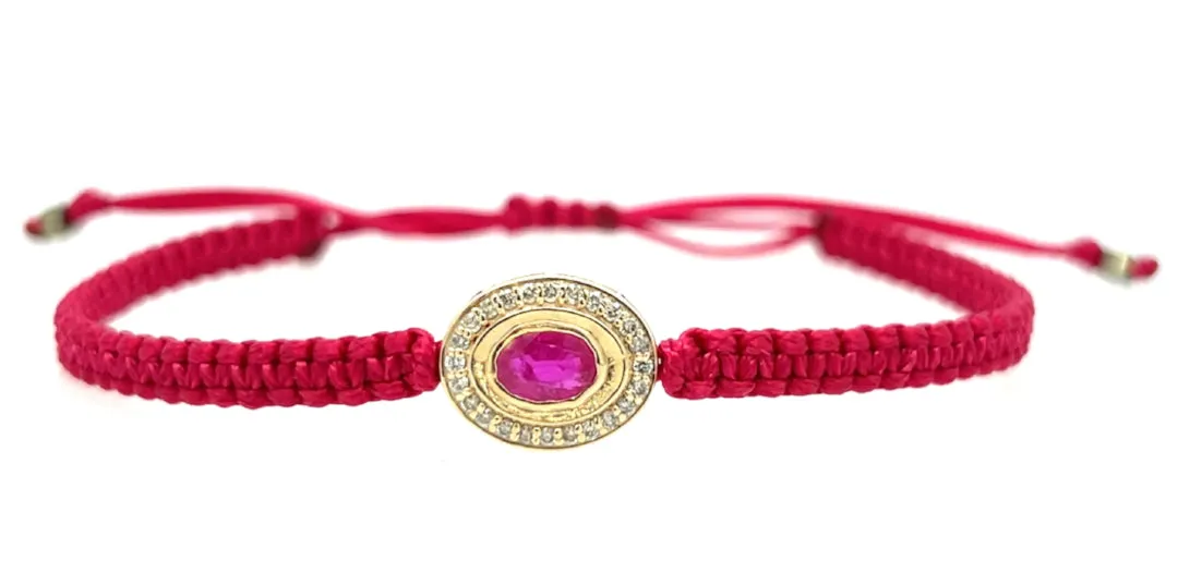 Ruby and Diamond braided bracelet in 10k yellow gold.