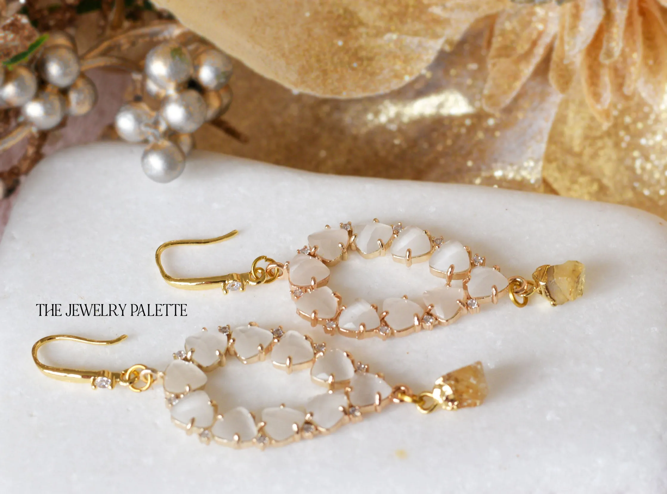 Yara white stones with gold edged aquamarine drop earrings